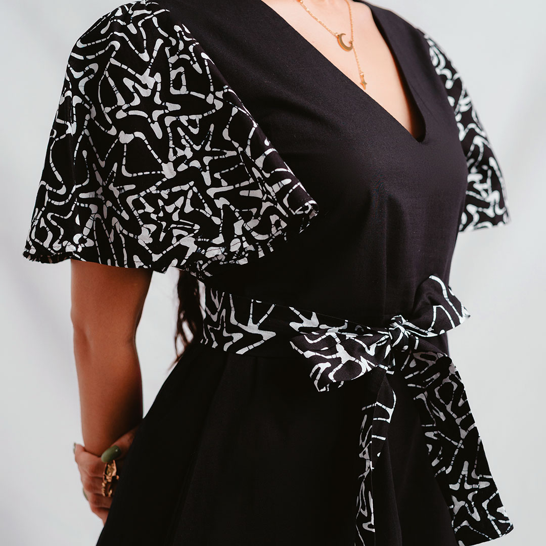 Fluttered-Sleeved-Chic-Black-Dress—Front-Close-up