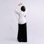 White-Wrap-Top-&-Flowy-Black-Pants—Front